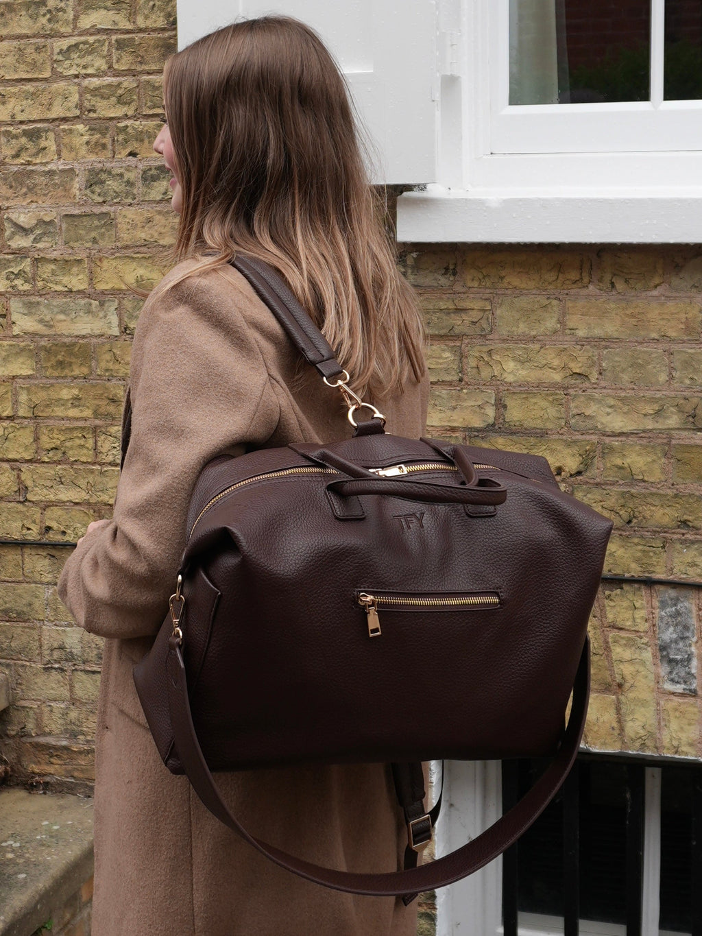 MULTI-WAY CHANGING BAG